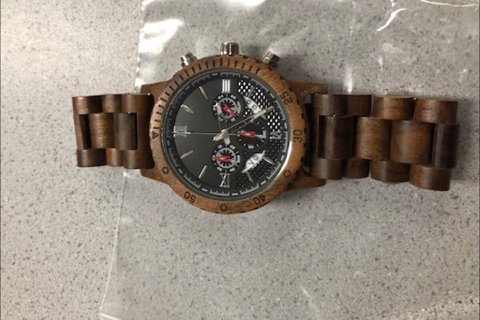 VicPD is looking for the owner of a wood watch found in Victoria with a heartwarming inscription. (Courtesy VicPD)