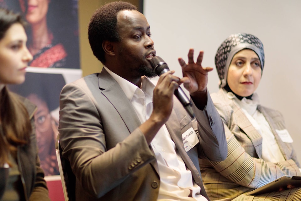 27168301_web1_211112-VNE-here-job-fair-Aboubakar-Idriss_1
