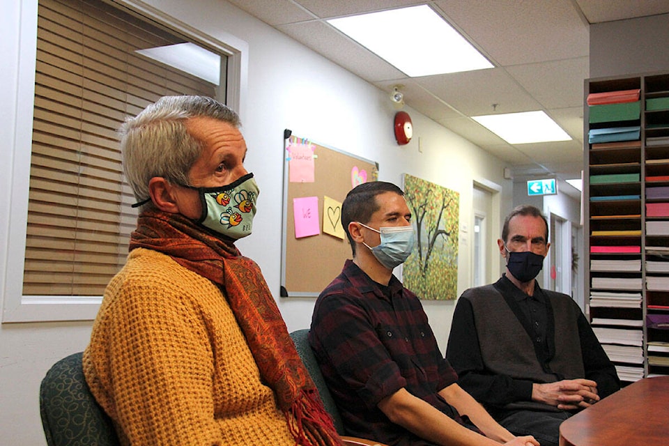 Neil Kingswell (left), Jason Rempel, and Paul Anderson are among seven former tenants of 118 Menzies St. pursuing legal action against the apartment building owner. (Jane Skrypnek/News Staff)