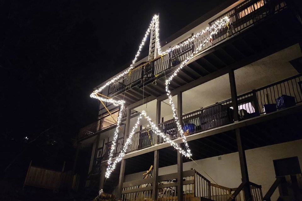 At more than nine metres wide, the enlarged Colwood Star can be seen from afar, now that it is remounted on the back of Dwayne Gordon and Leah Moreau’s Triangle Mountain home. (Photo Courtesy of Chris Gordon)