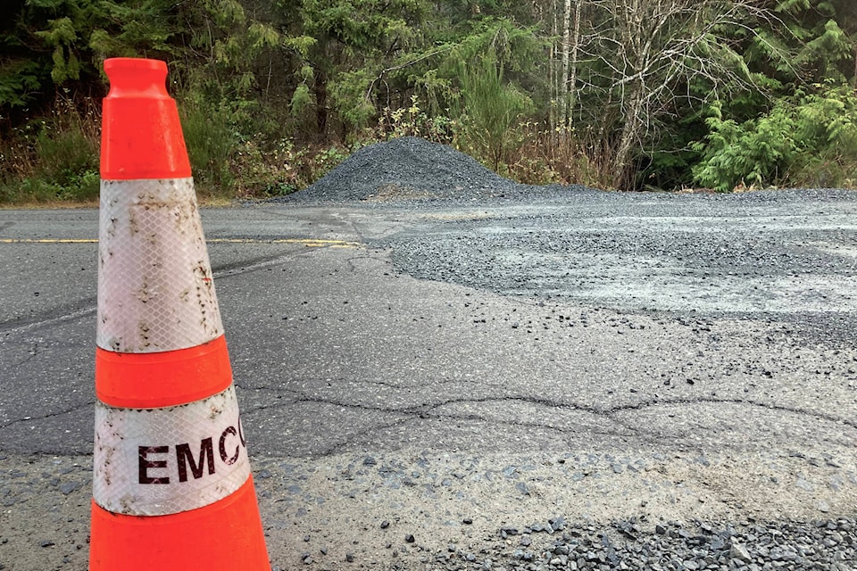 EMCON has marked the repairs to the sinkhole with cones and warning signs. These repairs are temporary, the road won’t be fully repaired until summer 2022. (Bailey Moreton/News Staff)