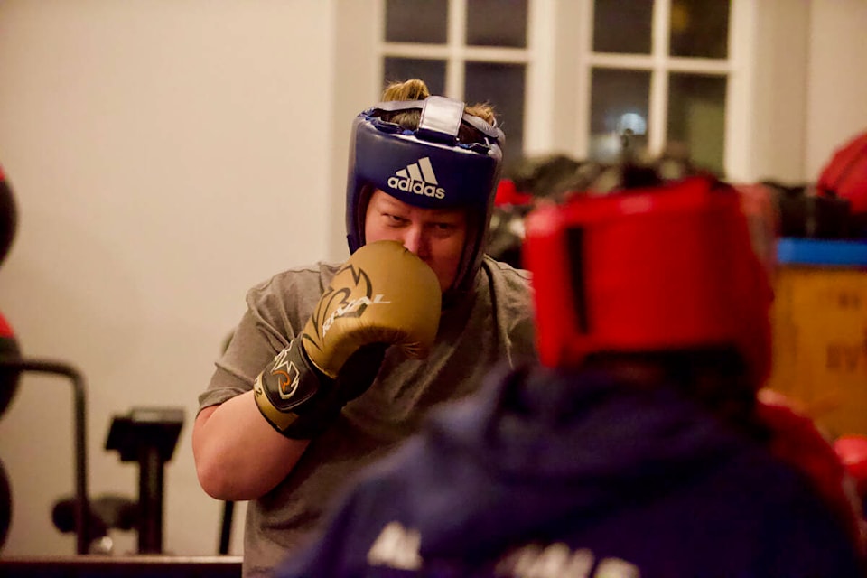 Tia Nunn spars during a practice Feb. 23 at the Sooke Boxing Club’s new location. (Justin Samanski-Langille - Sooke News Mirror)