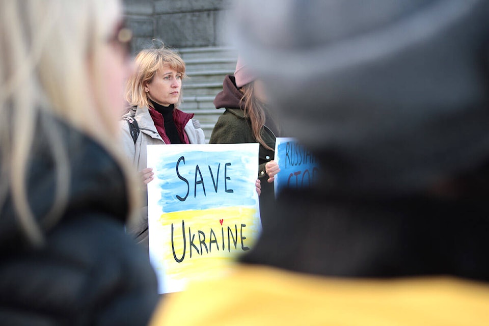 Members of Greater Victoria’s Ukrainian community at a solidarity gathering outside the B.C. legislature on Feb. 24, less than a day after Russia’s military attacked Ukraine on multiple fronts. (Jake Romphf/News Staff)