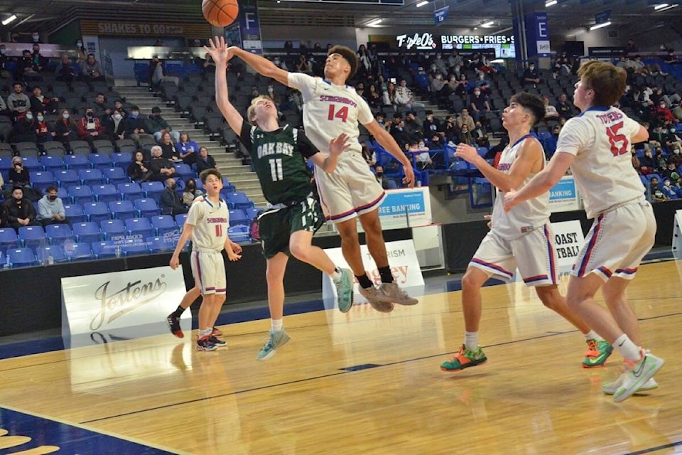 Heath Taylor takes a shot as Oak Bay faces Semiahmoo in the 2022 B.C. High School Boys 4A Basketball Tournament March 9 to 12. (Gary Ahuja/Langley Events Centre)