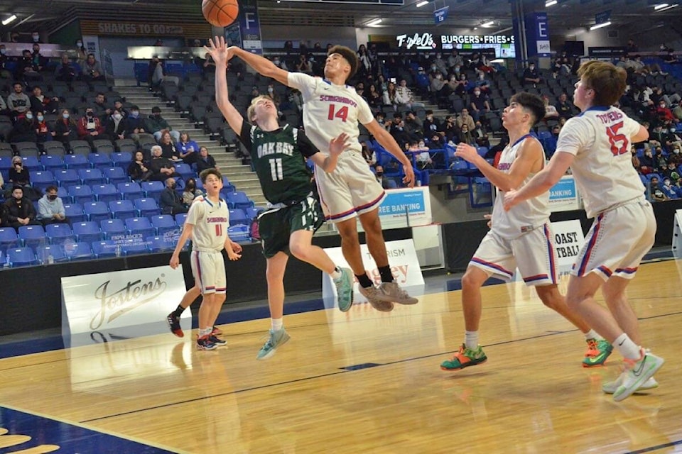 Heath Taylor takes a shot as Oak Bay faces Semiahmoo in the 2022 B.C. High School Boys 4A Basketball Tournament March 9 to 12. (Gary Ahuja/Langley Events Centre)