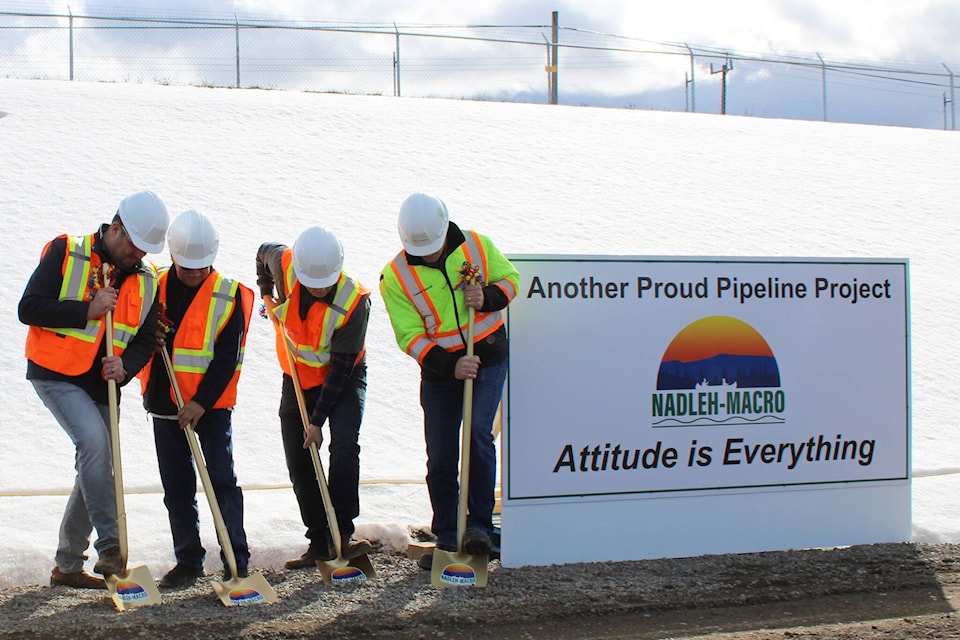 Frost Lake Logging President Scott Kirschke, Nadleh Whut’en Chief Larry Nooski, Macro Pipelines part-owner Jeff Redmond and Coastal GasLink pipeline implementation west director Dan Bierd break ground for the Nadleh-Macro pipeline construction partnership on March 17 at Lejac. (Photo by Michael Bramadat-Willcock/Omineca Express)