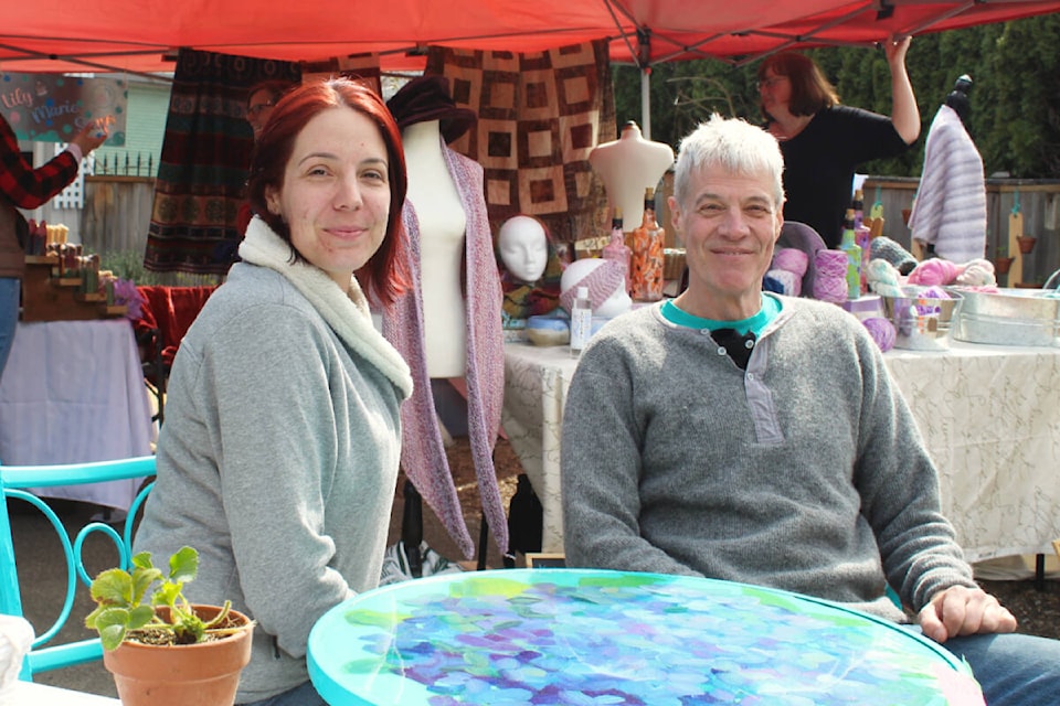 Megan Seel (left) and her dad Jim Lord at the maker’s market in Lord’s home that he shares with his partner Kari Frazer. (Megan Atkins-Baker/News Staff)