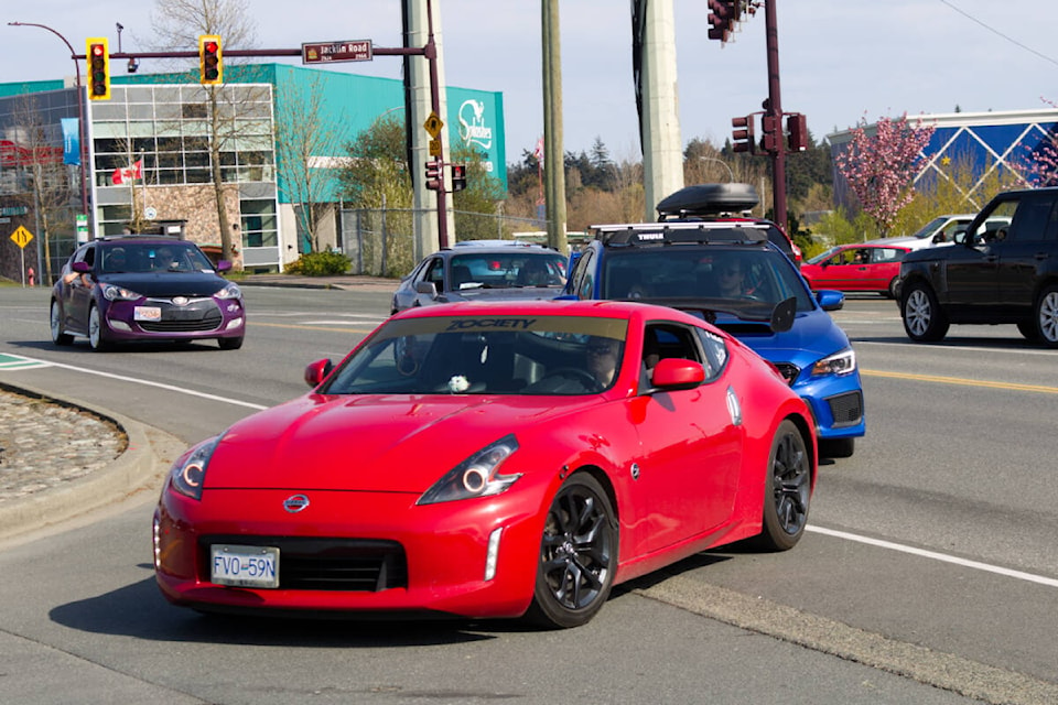 Participants pull into Fountain Tire in Langford after completing the Sarah Beckett Memorial Cruise on April 24. (Bailey Moreton/News Staff)