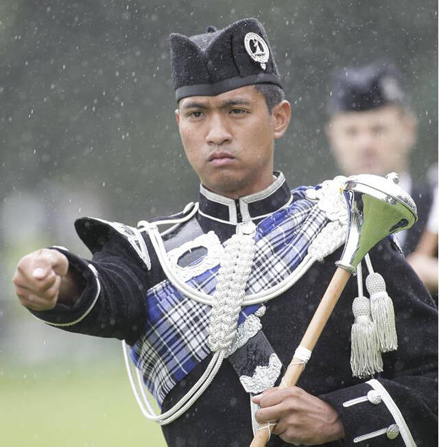 Current and 6-time World Champion Drum Major Jason Paguio performs at Victoria Highland Games 2022.