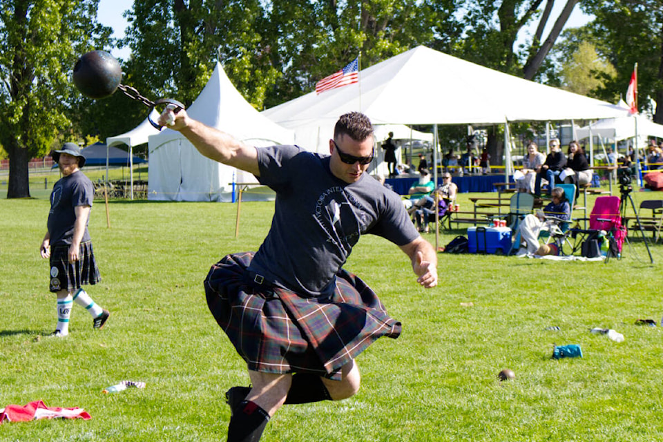 Ben Todd competes in the weight for distance competition at the Victoria Highland Games and Celtic Festival in Topaz Park on May 22, 2022. (Bailey Moreton/News Staff)
