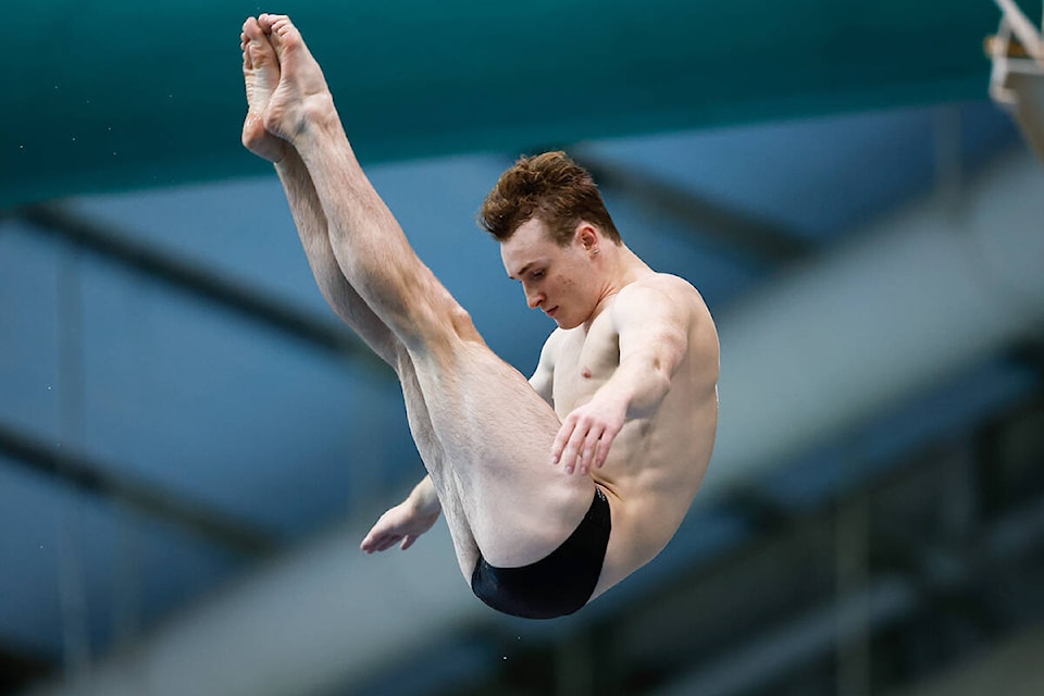 Boardworks diver Bryden Hattie is a picture of focus during competition at the Diving Canada Summer Senior National Championships at Saanich Commonwealth Place. Hattie won gold in the one-metre and three-metre events last weekend to secure a spot on the national team heading to the FINA Diving Grand Prix in Calgary next week, and the 2022 Commonwealth Games. (Antoine Saito/courtesy of Diving Canada)