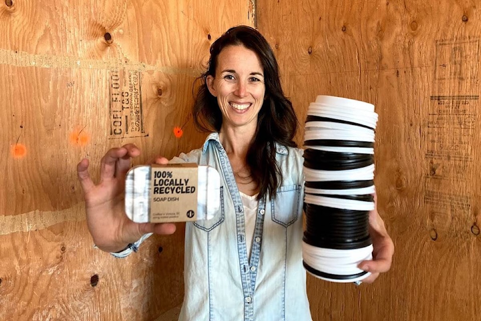 Laska Pare, founder and CEO of Flipside Plastics, with the Victoria company’s first soap dish model, made from coffee lids that were discarded at local cafes. (Courtesy of Flipside Plastics)