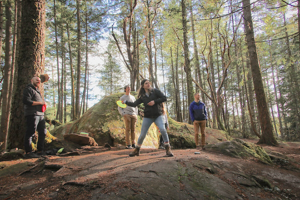 MeepMeep co-founder Eve Olynyk tosses a disc during a round of disc golf. (Courtesy of MeepMeep)