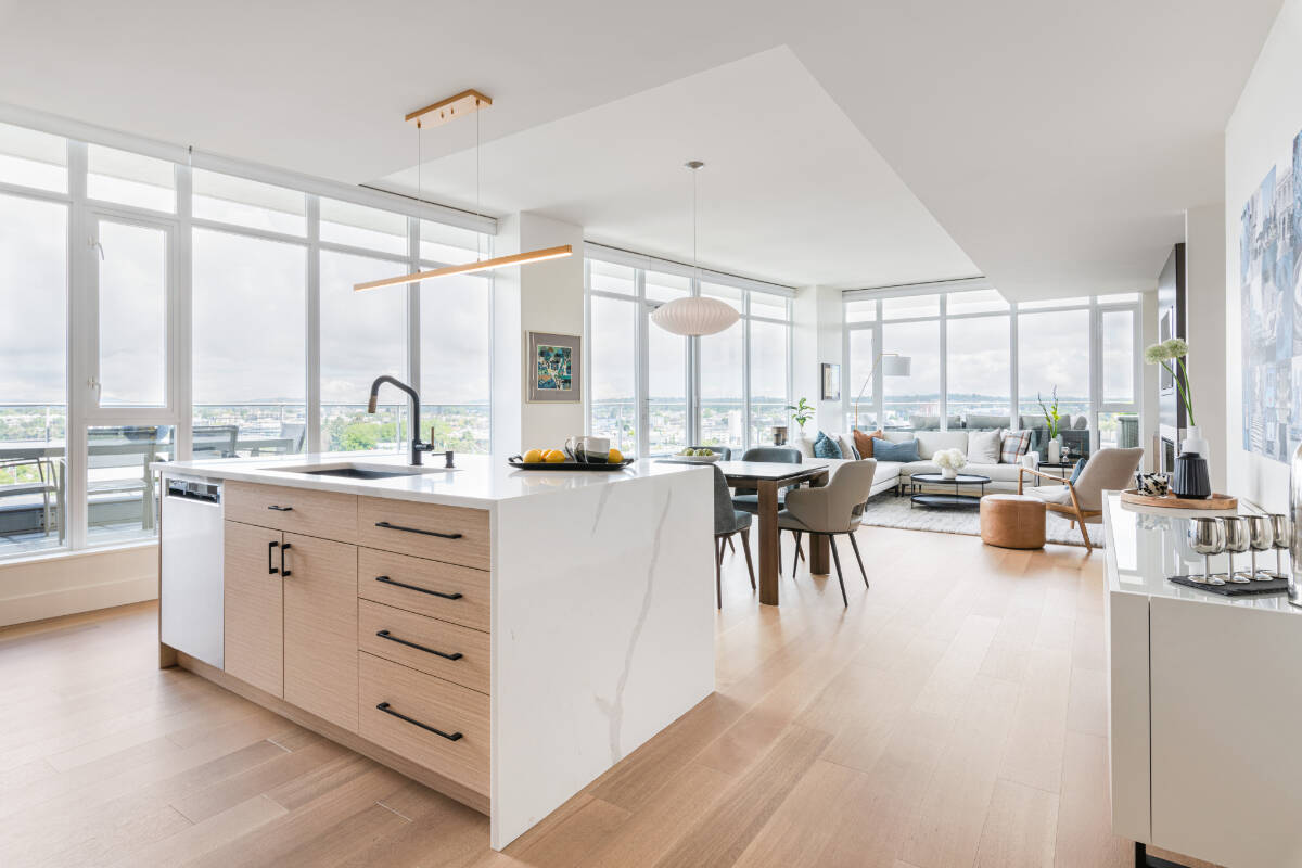Extending hardwood into the kitchen can create a seamless flow throughout the living space, and options like wide planks and long lengths can create a real Wow factor. MAC Renovations photo