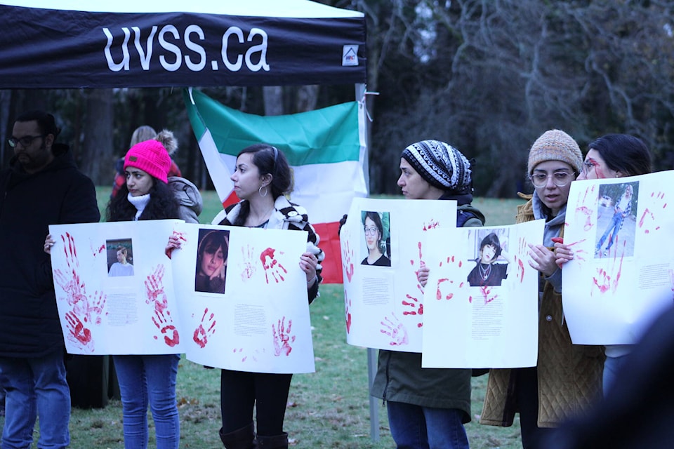 Students from the University of Victoria rally in front of McPherson Library to support the Iranian protests fighting for freedom. (Hollie Ferguson/News Staff)