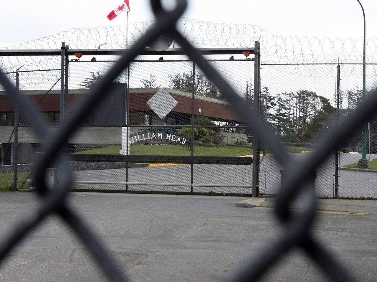 William Head Institution is shown through a security fence in Victoria, B.C., on Wednesday, Feb. 27, 2008. THE CANADIAN PRESS/Adrian Lam