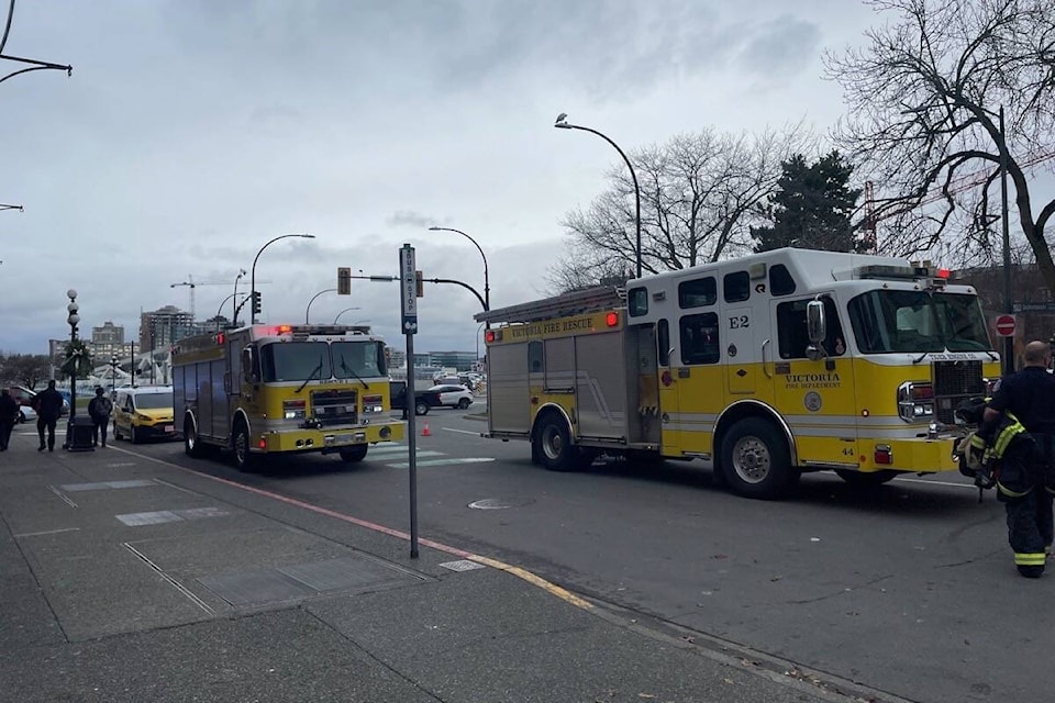 Victoria fire crews on scene Dec. 29 near the intersection of Wharf and Johnson streets. (Hollie Ferguson/News Staff)