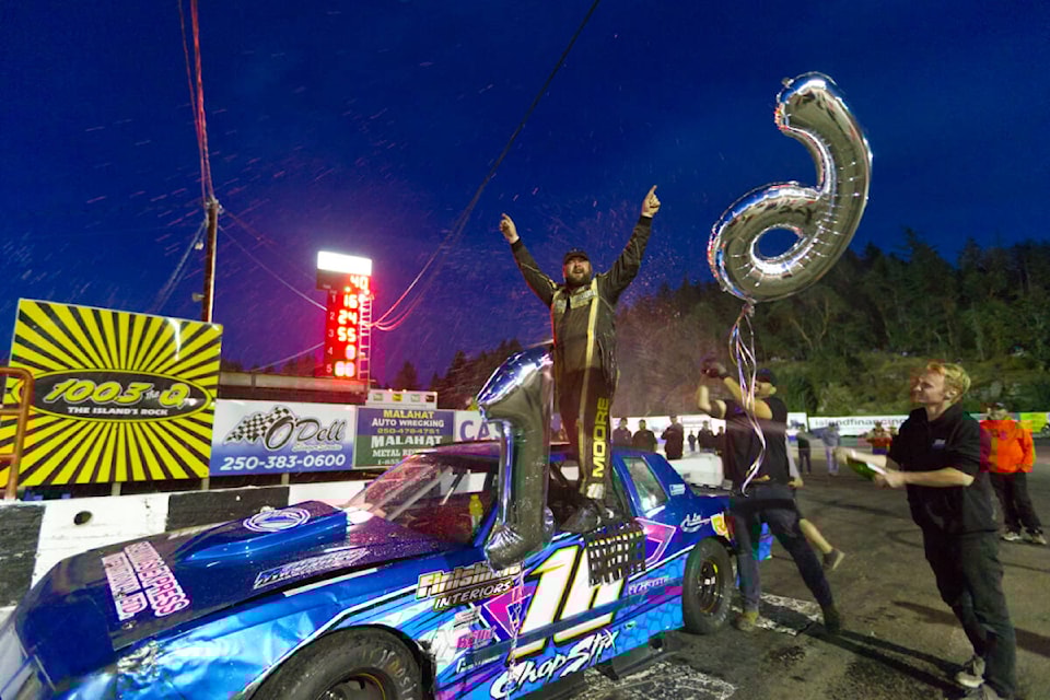 Brendon Moore celebrates after winning his race during the final race night at the Westshore Motorsports Park Saturday, Sept. 17, as the track shuts down permanently. (Justin Samanski-Langille/News Staff)
