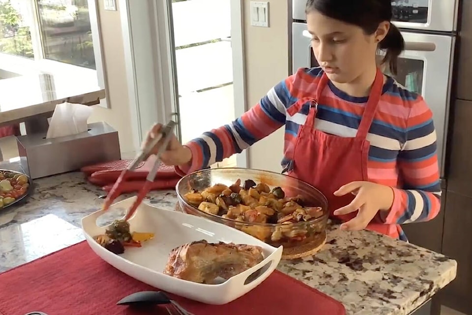 Saanich resident Adelaide Clark, 10, plates her award-winning roasted pork belly and vegetables with pear ginger sauce. The Frank Hobbs student won third place in the BC junior-level students category of the 2022 Field to Fork Challenge (Courtesy of Dominique Rochefort)