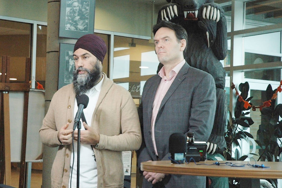 Federal NDP Leader Jagmeet Singh and Cowichan-Malahat-Langford MP Alistair MacGregor talk to the press at the Cowichan Community Centre on Jan. 26. MacGregor has been a vocal critic of the federal government’s actions on freighter anchorages off of Vancouver Island. (Robert Barron/Citizen)
