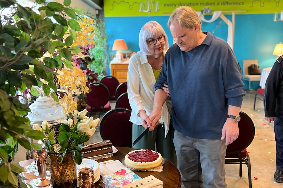 Eric and Denise Christensen married in a small ceremony Monday (April 24) at the Habitat for Humanity ReStore’s West Shore location where they first met as volunteers. Eric joked that one can find anything at the ReStore, ‘even love.’ (Courtesy of Habitat for Humanity Victoria)