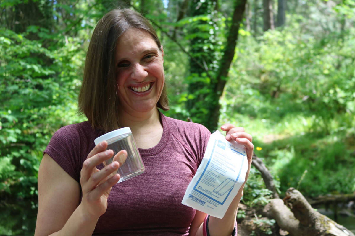 Jessica Tuomela holds a scent preservation kit, which her trained dog Lucy can use to find missing people. (Bailey Moreton/News Staff)