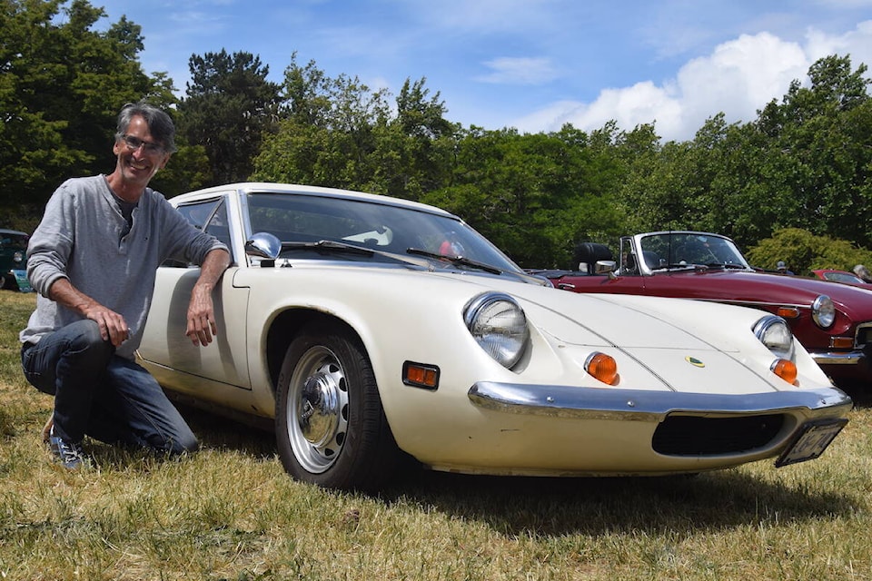 John Taylor shows off his 1970 Lotus Europa at the 37th annual Father’s Day British car show in Victoria Sunday. (Brendan Mayer/News Staff)