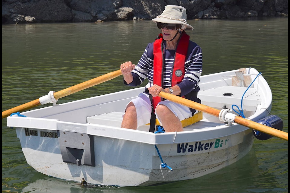 Bet Harmsworth goes out on the water in a plastic sailing dinghy named Hang Looser. (Brendan Mayer/News Staff)