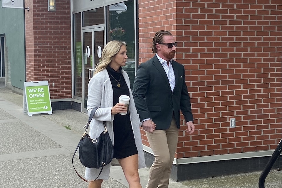 VicPD officer Ron Kirkwood walks to the disciplinary hearing on June 12.