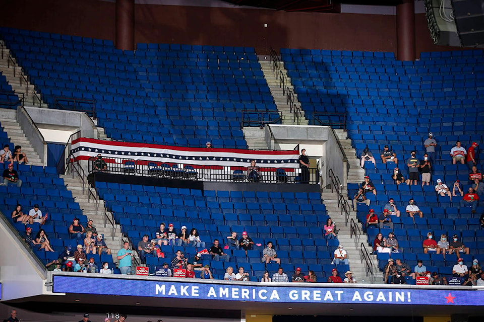 Empty seats are visible in the upper level at a campaign rally for President Donald Trump at BOK Center in downtown Tulsa, Okla., Saturday, June 20, 2020. (Matt Barnard/Tulsa World via AP)