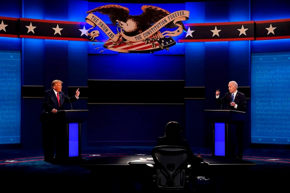 23217030_web1_201111-PWN-ElectionPollFollowUp-debate_1