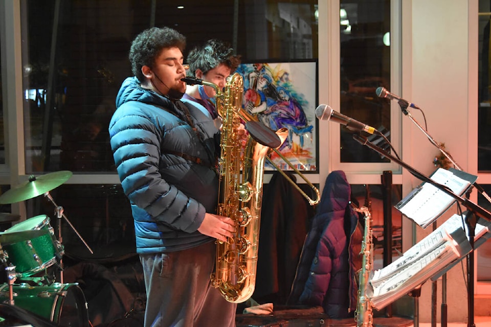 Grade 12 KSS student Afu Kuteca plays the saxophone for an eager audience at the Jazz Jam. (Cole Schisler photo)