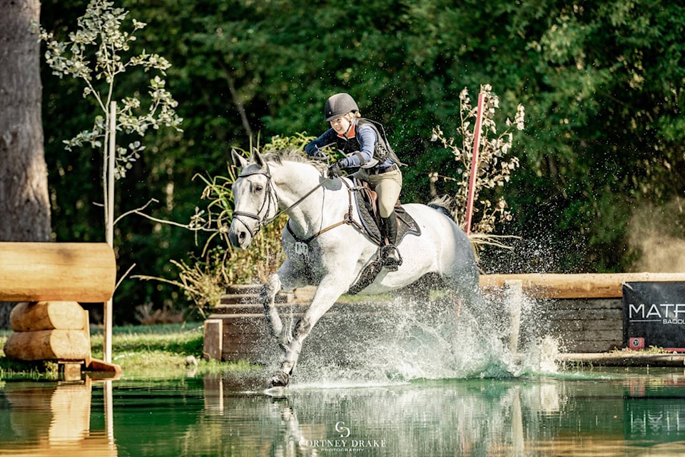 Carlie Wells from Chase tackles a cross-country course at the Aspen Farms Horse Trials in Yelm, Washington in September 2022 on CC Gipsy King where she took first place in Training level. She’s heading to New Zealand in January 2023 as part of the Canadian Pony Club team for the International Pacific Exchange. (Cortney Drake photo)