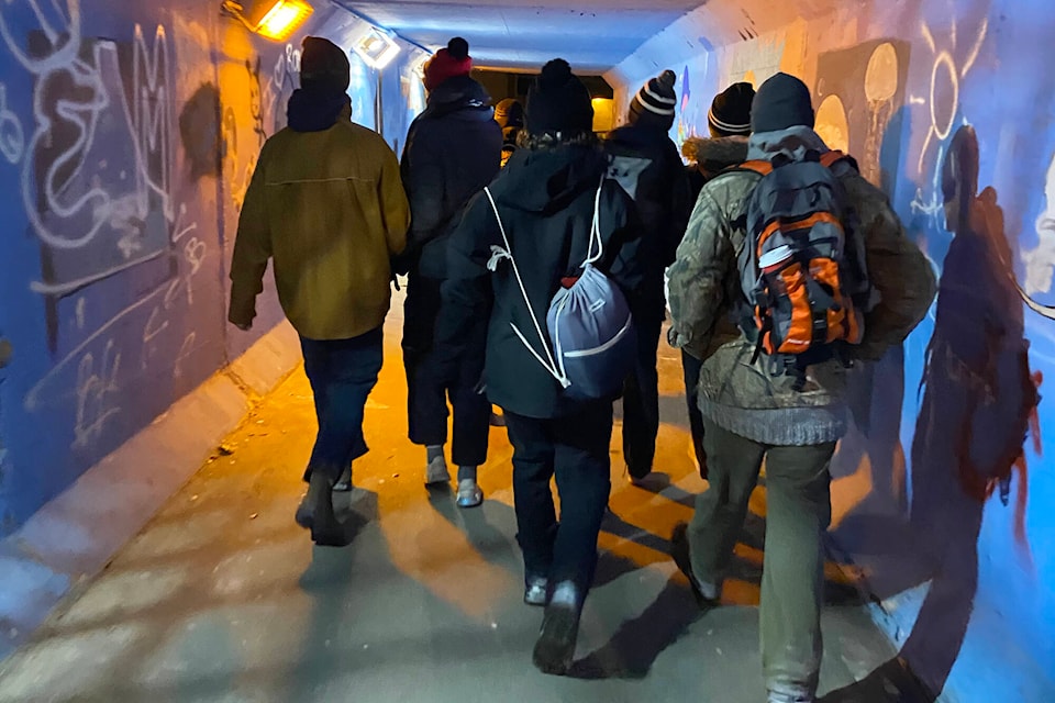 King’s Christian School Grade 10 students in the Family and Society class walk through the tunnel heading towards Salmon Arm Secondary’s Jackson campus during the 24-hour period when they were getting a better understanding of what it might be like to be without a home. (Photo contributed)