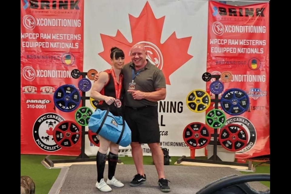 Tia Braithwaite (left) broke national records and ranked highest female at the 2024 WPC Canada Powerlifting nationals in Prince George. (Cody Braithwaite photo) 