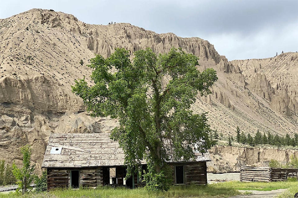 A small collection of buildings along the Chilco River was all that remained of the Pothole Ranch, once a thriving little Chilcotin homestead at Farwell Canyon. 