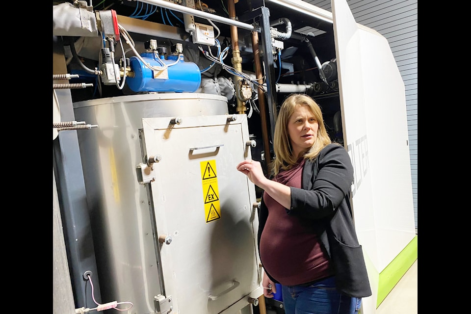 The Cariboo Wood Innovation Hub is a centre for learning and sharing ideas around value-added wood products, such as turning discarded wood into chips which can be used to generate power, as is the case with this power plant on site at the Alex Fraser Research Forest, whose manager Stephanie Ewen toured with visitors on Dec. 12.