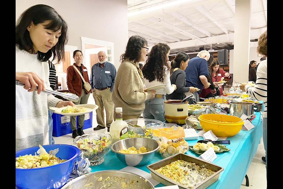 The CCPL annual Get Warm Potluck allows community members to connect over a warm meal filled with foods from around the world. 