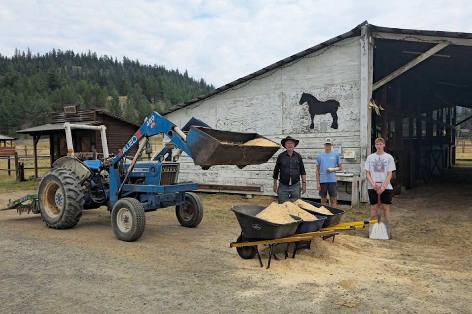 North Thompson Fall Fair and Rodeo volunteer Dan Hansen, left, keeps summer workers Dylan Matthews and Cayden Johnson busy. 