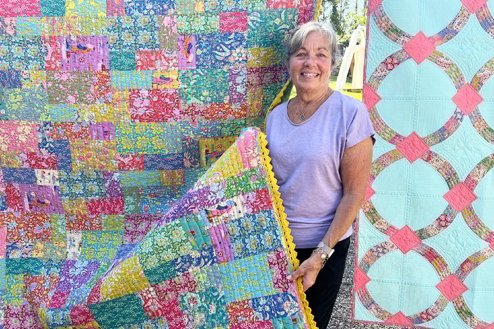 Linda Isfeld had her incredible quilts on display in the garden of Heather and Barry McKinney on July 6.