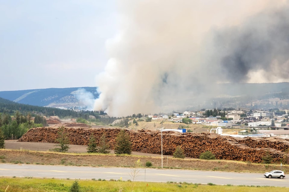A wildfire in Williams Lake Sunday, July 21 burning in and up both sides of the river valley. 