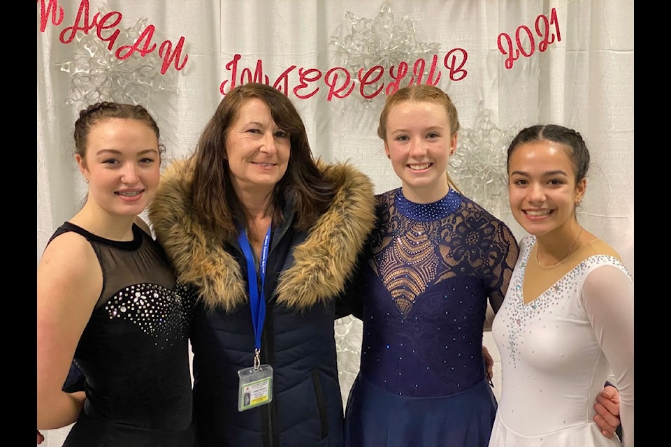 Williams Lake Skating club coach Joanne Macnair with her three Skate Canada Gold level test students. From left to right: Emma Penner, Macnair, Reagan West and Julia Bowman.