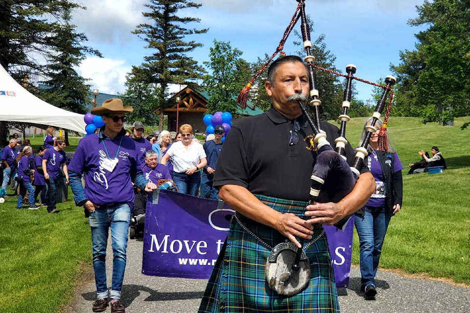 Aubrey Jackson pipes for the Williams Lake Move to Cure ALS walk in Boitanio Park Saturday, June 13. 