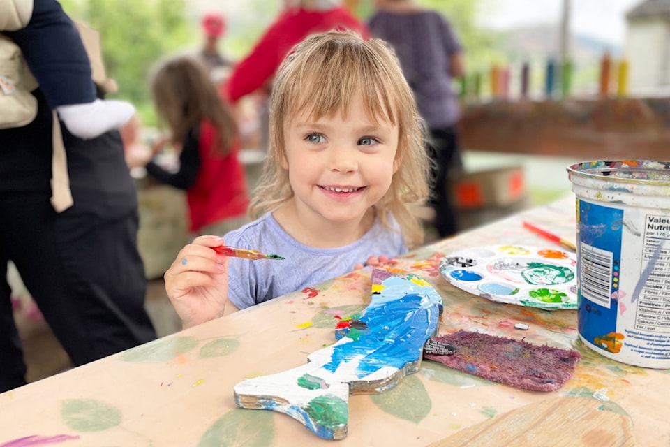 Sadie Lewis was doing a great job painting her fish at Marsh Magic on June 9 at Scout Island in Williams Lake.