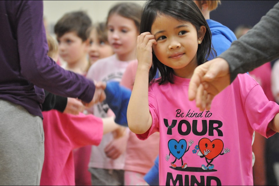 Cataline student Angeliz Serrano wears a shirt that reads 'be kind to your mind' on Pink Shirt Day to show her support against bullying. 
