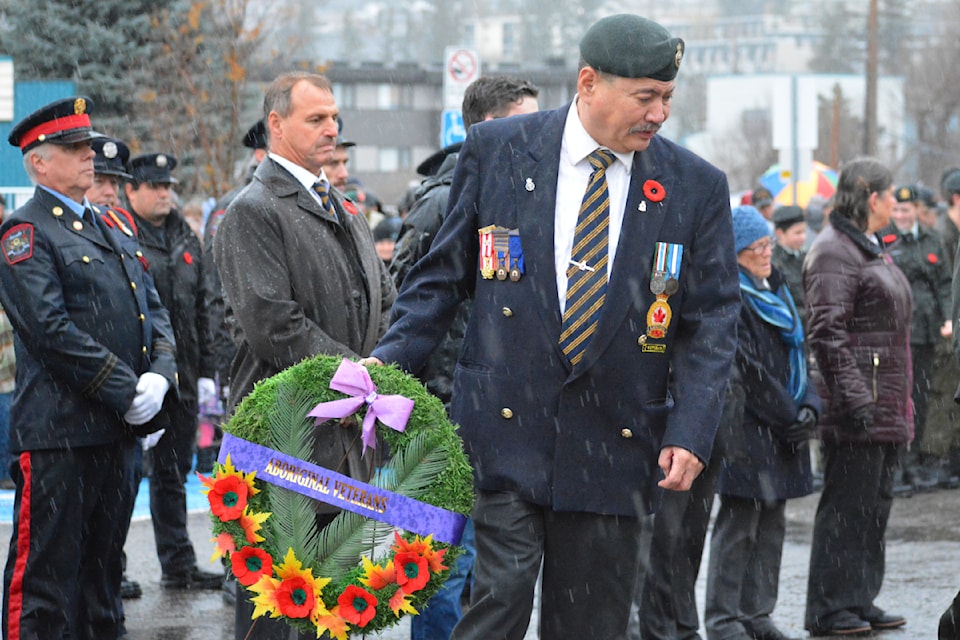 Gord Keener carries the wreath for Aboriginal Veterans during the 2924 Remembrance Day ceremony in Williams Lake. 