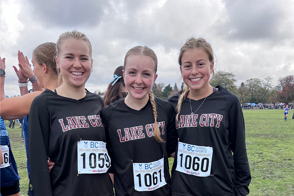 Williams Lake cross-country runners Kiera Dyer, Nadia Wallin and Ella Thiessen share some broad smiles at the provincials at Jericho Beach in Vancouver Nov. 2. 