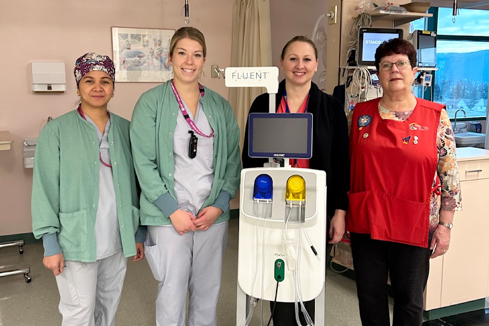 Cariboo Memorial Hospital Cristina Panida, LPN, left, Ashley Straza, RN, Tegwen Adamson, clinical operations manager RN and Judy Newbery, Cariboo Memorial Hospital Auxiliary Society president, pose with a new fluent system machine for the obstetrics department. CMHAS contributed $20,000 towards the purchase of this machine.