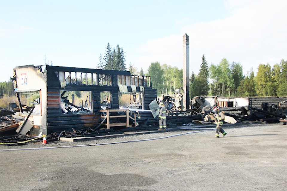 A fire destroyed a building in Lone Butte in September which destroyed two businesses. (Patrick Davies photo - simplymastery_