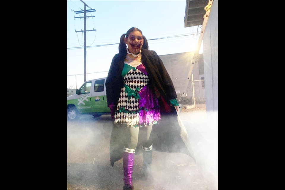 Lillian dressed as a clown for the Boys and Girls Club Haunted House. 